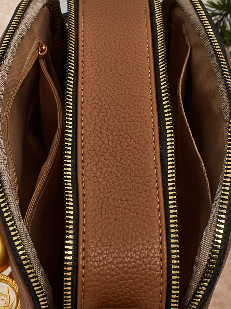 Naiste väike tepitud ökonahast käekott Connere