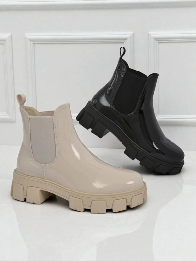 Royalfashion Lakitud ökonahast massiivse tallaga poolsaapad Calista Weide