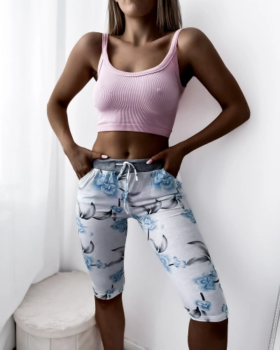 Royalfashion White women's 3/4 shorts with floral pattern