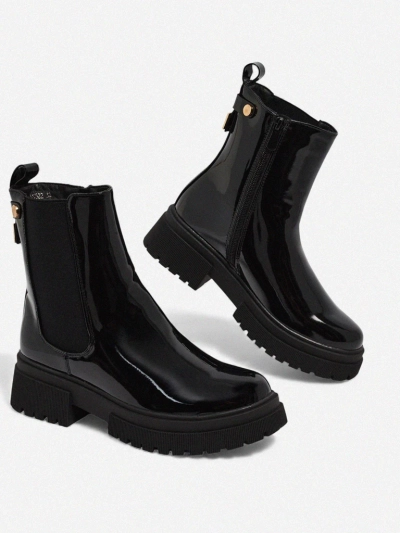 Lakitud kunstnahast naiste saapad Calebi