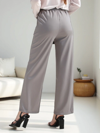Royalfashion Wide women's trousers with a decorative buckle