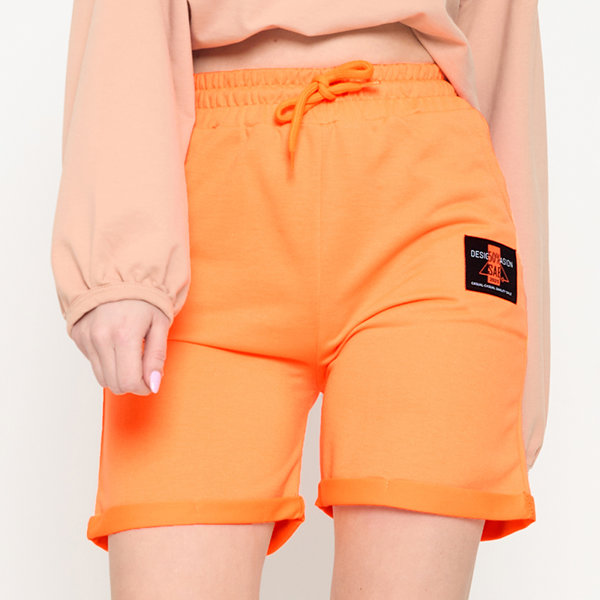 Neon orange women's shorts above the knee - Clothing