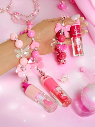 Lip gloss for children with bracelet Colorless