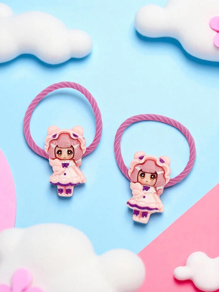 Bambina Rosetta hair elastics with a doll motif