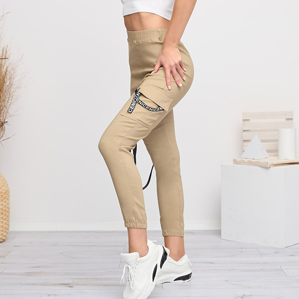 Beige women's cargo pants with a belt - Clothing