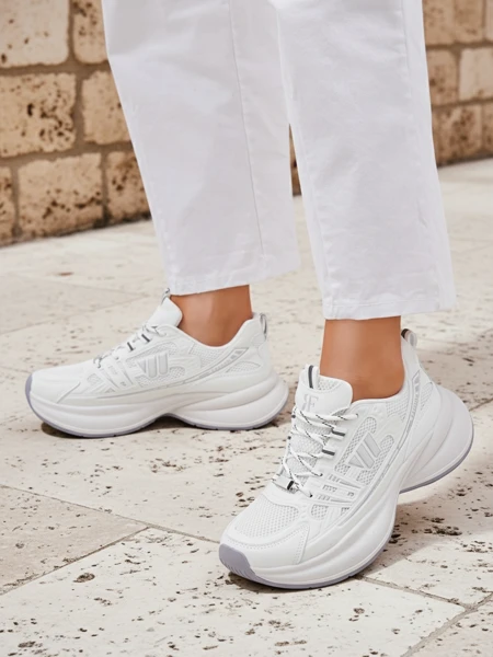 Royalfashion Naiste sportjalatsid paksemal tallal Roality