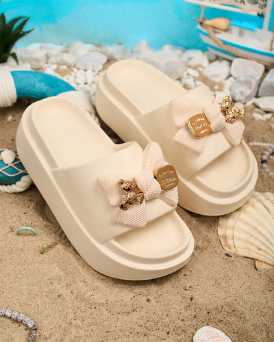 Royalfashion Women's rubber flip-flops with decorative bow Nilm