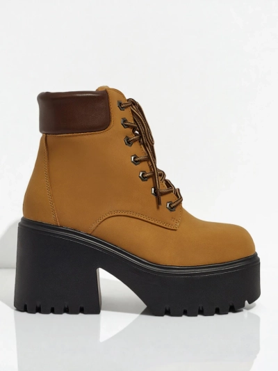 Naiste öko-seemisnahast poolsaapad Tavlissa, platvormi ja paksu kontsaga.