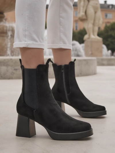 Royalfashion Women's ankle boots with a block heel Miezo