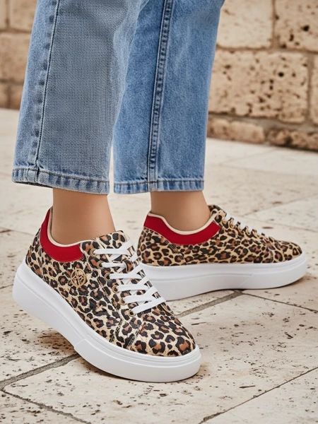 Royalfashion Naiste perforatsiooni spordijalatsid Leopess