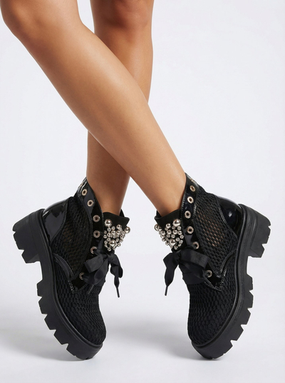 Royalfashion Women's openwork boots in black Afaserr
