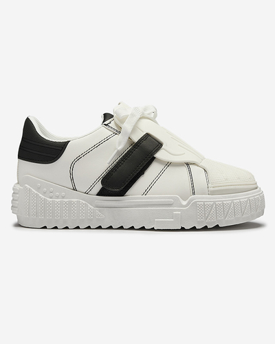 Mustad ja valged naiste spordijalatsid kummist sisetaldadega Inika - Jalatsid