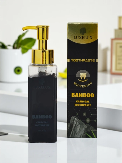 LUXELUX Отбеливающая зубная паста с таурином и активированным углем