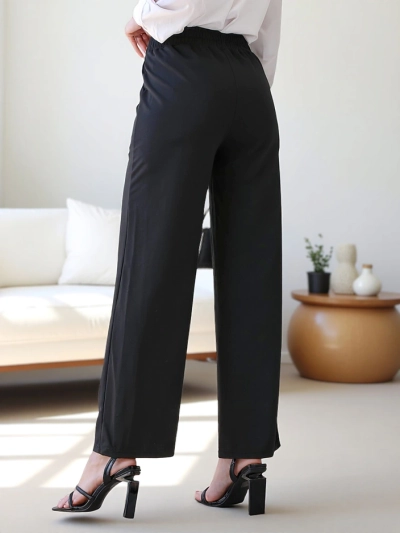 Royalfashion Wide women's trousers with a decorative buckle