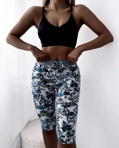 Mustrilised naiste 3/4 türkiisvalged lühikesed püksid PLUSS SUURUS - Riietus