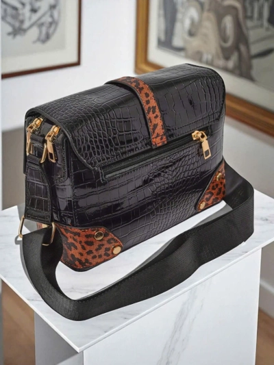 Naiste käekott Callista Nero - ökoloogiline krokodillinahk, must-pruun