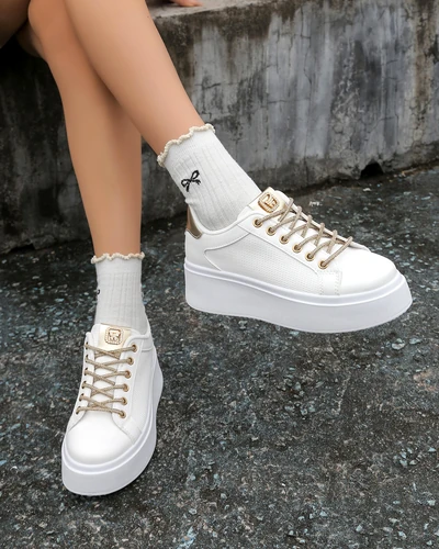 Royalfashion Naiste sportlikud sneakerid dekoratiivsete paeltega Eone