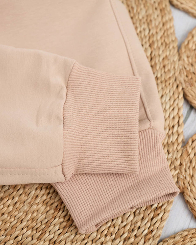 Women's beige sweatpants with a colored patch - Clothing