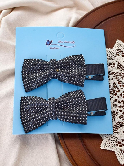 Royalfashion 2 lipsudega juukseklambrite komplekt, lipsude ja sädelevate kivikestega Isadora