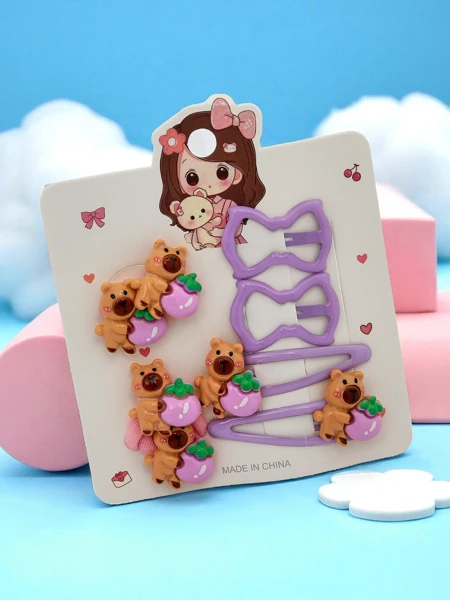 Set of hair clips with bear and bow motifs