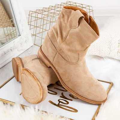 Cowboy boots on heels in beige Brunoki - Footwear