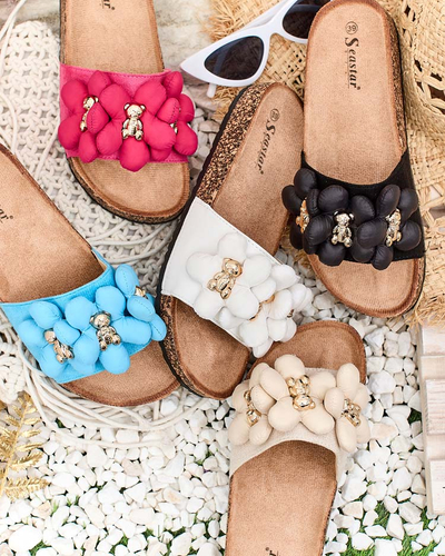 Royalfashion Naiste flip-flops kuldsete karude ja lilledega Isaralle