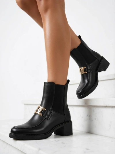 Royalfashion Women's ankle boots on a low heel Ewios