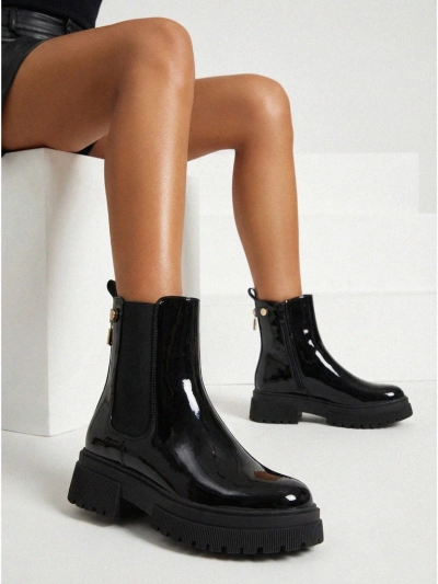 Lakitud kunstnahast naiste saapad Calebi