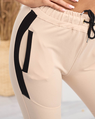 Ladies' beige sweatpants with inserts- Clothing