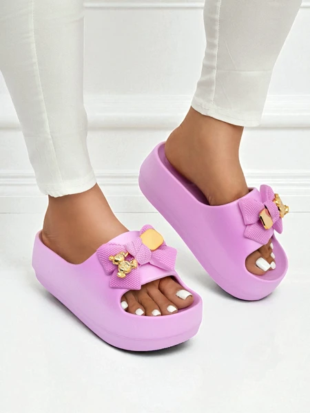 Royalfashion Women's rubber flip-flops with a decorative bow Alday