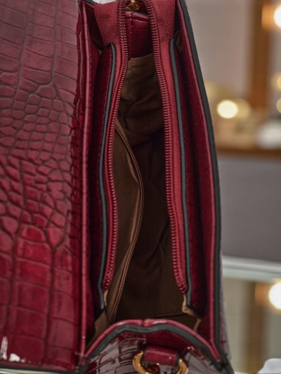 Lakitud väike naiste ökonahast käekott Veluna