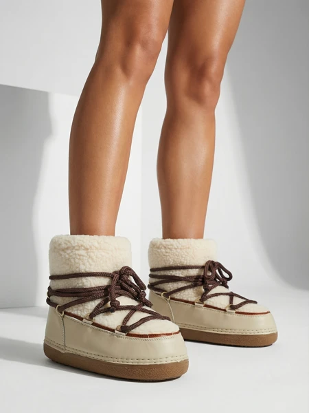 Naiste kasukaga saapad Uvella