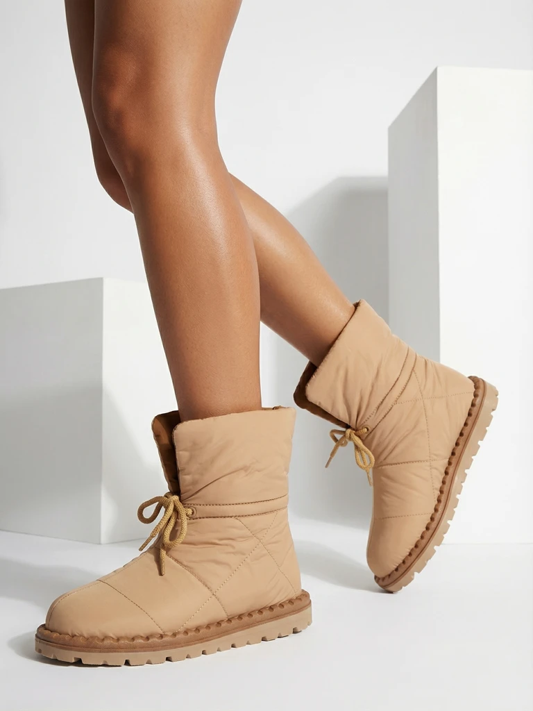 Royalfashion Women's slip-on snow boots in brown Nevonsis