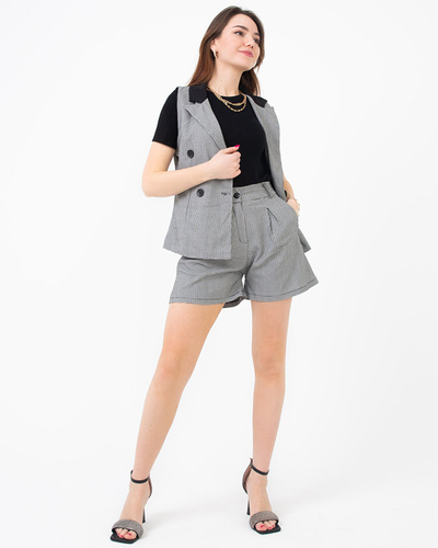 Must valgeruudulise mustriga naiste ülikond - Riietus