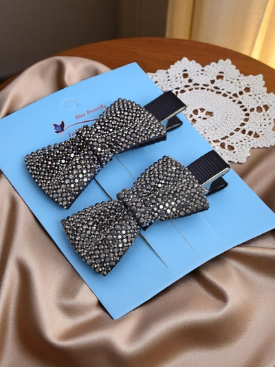 Royalfashion 2-osaline lipsukestega ja kivikestega juukseklambrite komplekt Isadora