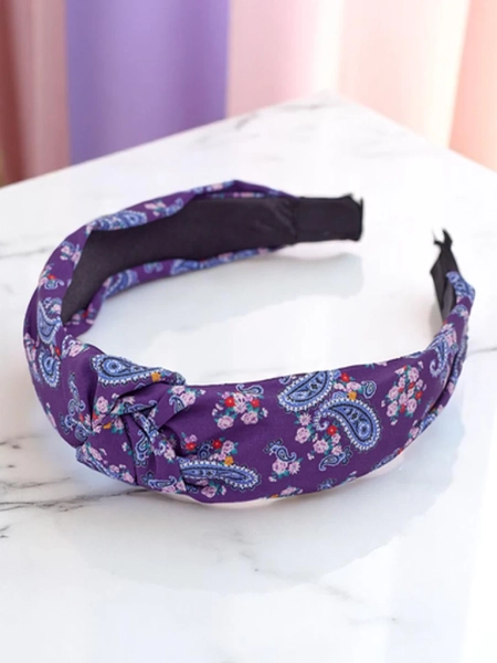 Royalfashion Molly Twist mustriga punutud peapael