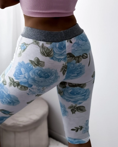 Women's white 3/4 length shorts with blue flowers - Clothing