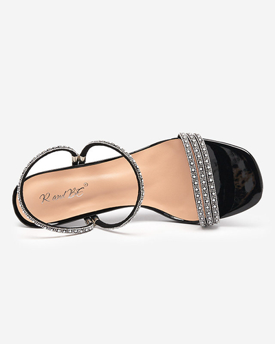Black lacquered slippers with low heels Lakopi - Footwear