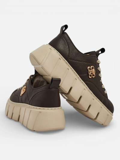 Naiste naturaalsest nahast sportlikud tossud Taures