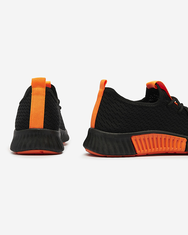 Mustad naiste spordijalatsid oranži sisekattega Keteti - Jalatsid