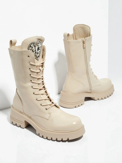 Lakitud paeltega naiste poolsaapad Emelune