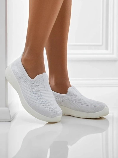 Women's white Callista slip-ons made of breathable fabric with a flat heel