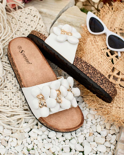 Royalfashion Naiste flip-flops kuldsete karude ja lilledega Isaralle