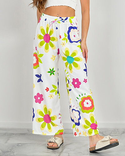 Royalfashion Naiste laiad lillemustrilised riidest püksid