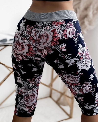 Royalfashion Navy blue and coral women's 3/4 shorts with floral pattern PLUS SIZE