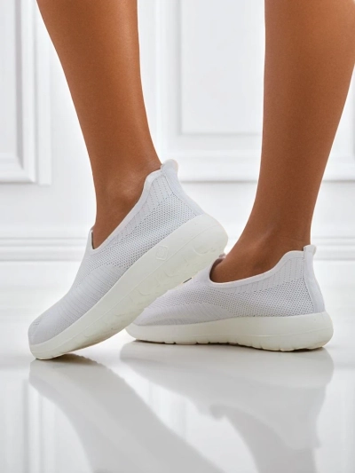 Women's white Callista slip-ons made of breathable fabric with a flat heel