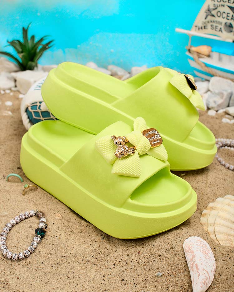 Royalfashion Naiste kummist flip-flopid dekoratiivse vibuga Nilm