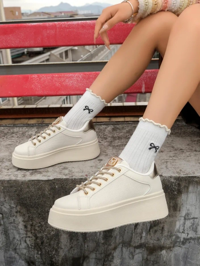 Royalfashion Women's sporty sneakers with decorative laces Eone