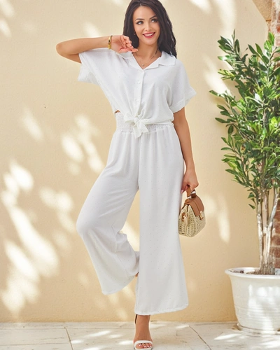 Royalfashion Women's set with a tied short-sleeve shirt and flared pants with rhinestones