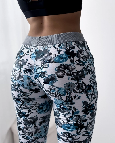 Naiste valged ja lillelised 3/4 lühikesed püksid PLUSS SUURUS - Riietus